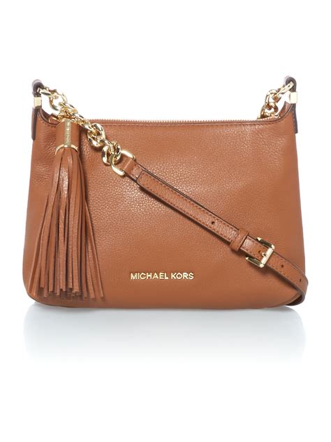 tan michael kors bag with pink straps|Michael Kors tan crossbody bag.